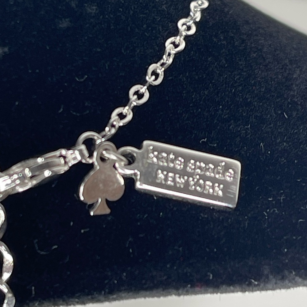 Kate Spade Infinity and Beyond Silver Tone Rhinestone Knot Pendant Necklace - Picture 9 of 12